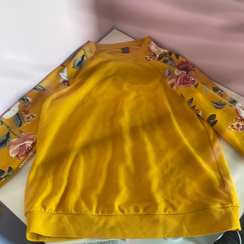 yellow shirt with floral sleeves